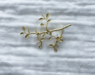 Broche ramitas bosque