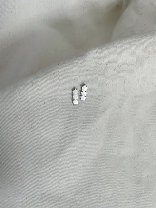 Pendientes triple estrellitas cascada plata