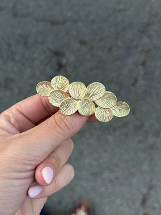 Broche levante