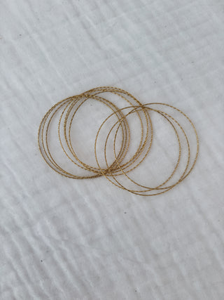 Pulseras multi doradas