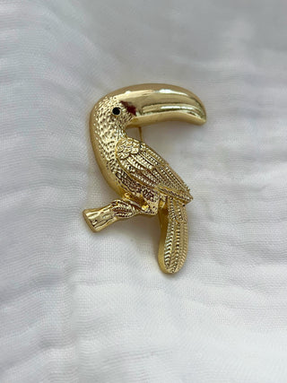 Broche tucán